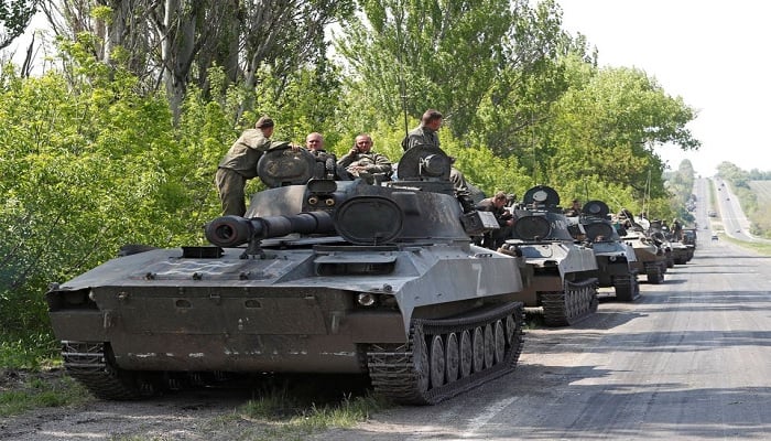 Service members of pro-Russian troops are seen atop of armoured vehicles during Ukraine-Russia conflict outside Donetsk, Ukraine May 13, 2022.—Reuters