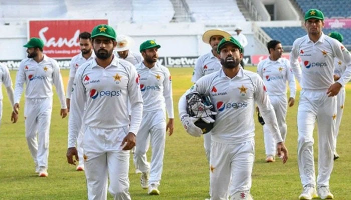 Skipper Babar Azam (left) and wicket-keeper batter Mohammad Rizwan (right) walk back to the pavilion after innings end in this undated photo. — Twitter/File