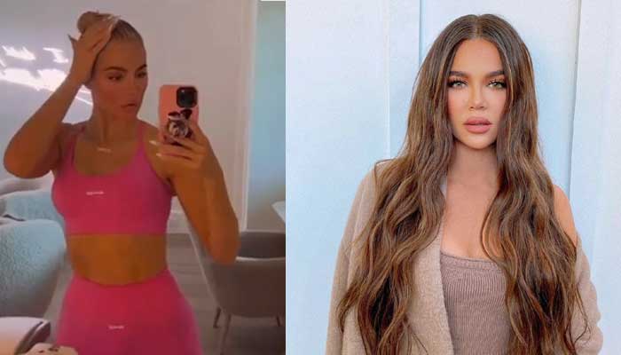 Khloe Kardashian teases her new beau as she puts gym-honed abs on display in hot pink crop top