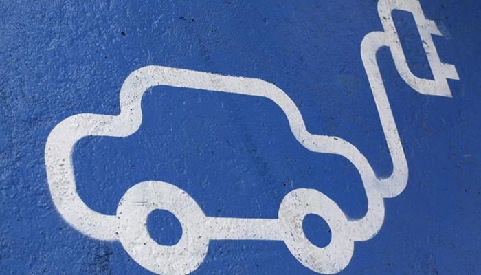 The logo of an electric car is painted on the road during the opening ceremony of the first Latin American public charging station, at Santiago, April 20, 2011. — Reuters/File