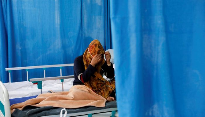 An Afghan woman sits on a hospital bed in Kabul.  — Reuters