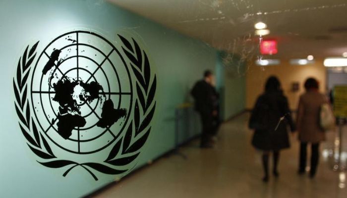 The United Nations logo is displayed on a door at UN headquarters in New York on February 26, 2011. —Reuters