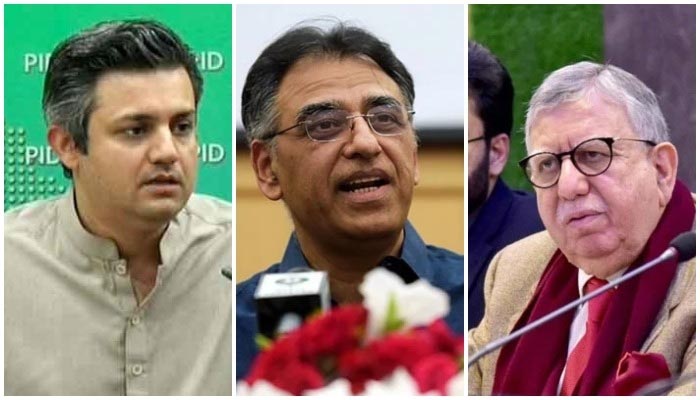 (L-R) PTI leaders Hammad Azhar, Asad Umar, and Shaukat Tarin. — AFP/PID/Twitter