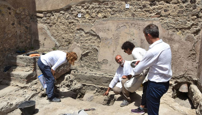 Archaeologists work next to a preserved land tortoise which was found among the excavations in the archaeological site of the ancient Roman city of Pompeii, Italy, in this undated photo obtained by Reuters on June 24, 2022. — Reuters