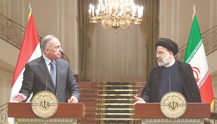Iran’s President Ebrahim Raisi (right) speaking at a joint press conference with Iraqi Prime Minister Mustafa al-Kadhemi on Sunday.—AFP