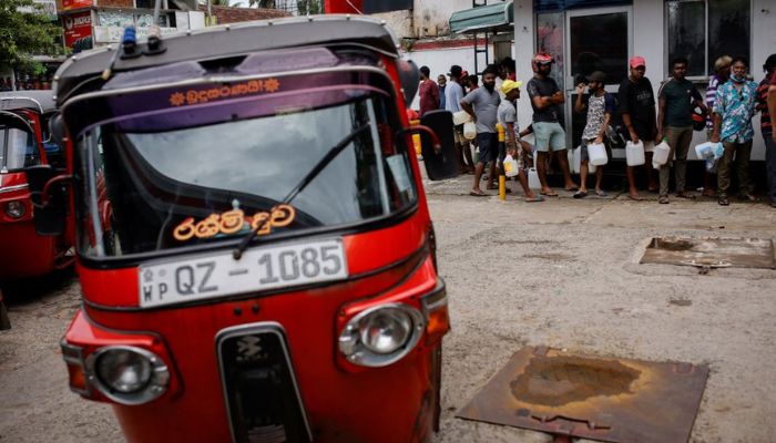 People wait in a queue to buy petrol at a fuel station, amid the countrys economic crisis in Colombo, Sri Lanka, May 16, 2022.—Reuters