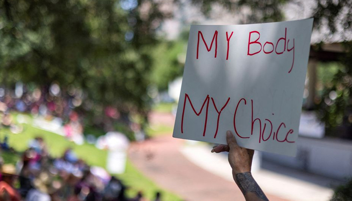 A protester holds a sign during nationwide demonstrations following the leaked Supreme Court opinion suggesting the possibility of overturning the Roe v. Wade abortion rights decision, at Duncan Plaza in New Orleans, Louisiana, US, May 14, 2022. — Reuters