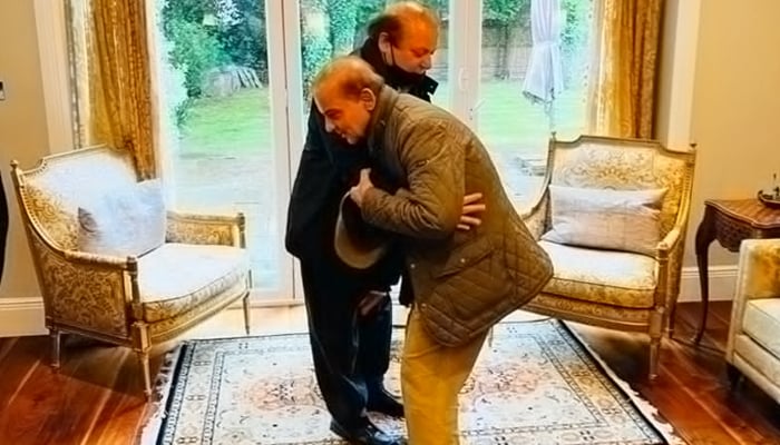 PML-N supremo Nawaz Sharif (left) greets his brother Prime Minister Shehbaz Sharif in London on May 11, 2022. — Twitter/Maryam Nawaz