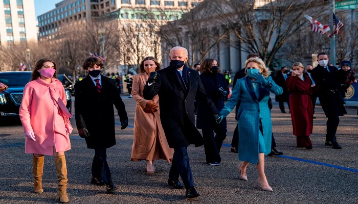 President Joe Biden and first lady Jill Biden walk along Pennsylvania Avenue in front of the White House during Inaugural celebrations, on January 20, 2021 with family members after US President Biden was sworn in as the 46th President of the United States.—AFP