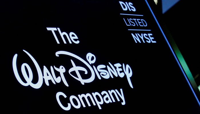 A screen shows the logo and a ticker symbol for The Walt Disney Company on the floor of the New York Stock Exchange (NYSE) in New York, U.S., December 14, 2017. — Reuters
