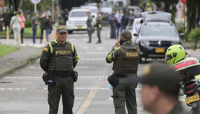 Police block access to a jail that was the site of a deadly fire in Tulua, Colombia. Photo— AP