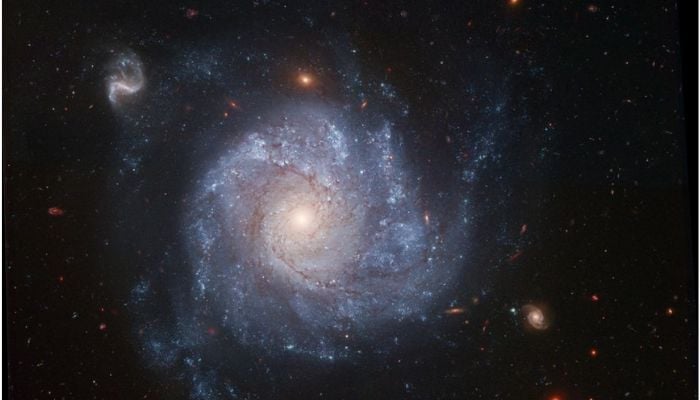 A 2005 image of the spiral galaxy NGC 1309, the location of a star explosion – a supernova - that did not result in stellar death.—Reuters