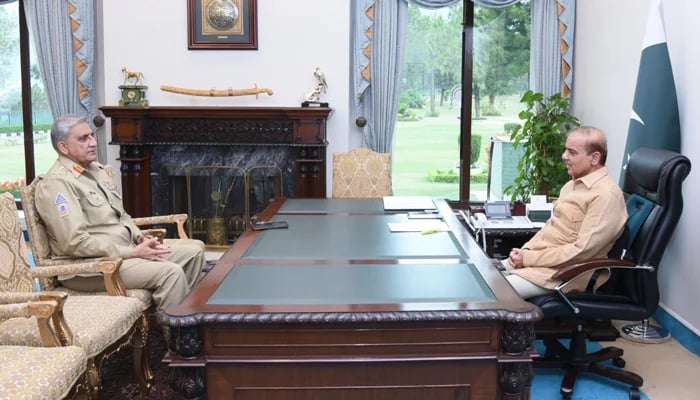 Chief of Army Staff General Qamar Javed Bajwa (left) calls on Prime Minister Shehbaz Sharif at the Prime Ministers Office in Islamabad, on April 19, 2022. — PakPMO