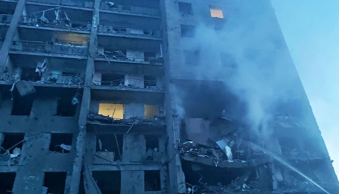 This handout picture taken and released by the Ukraines State Emergency Service on July 1, 2022, shows a firefighter putting out the fire in a residents building hit by a missile strike in Ukrainian district of Bilhorod-Dnistrovskyi outside Odesa, killing at least 16 and 30 injuring. — AFP/Ukrainian State Emergency Press service