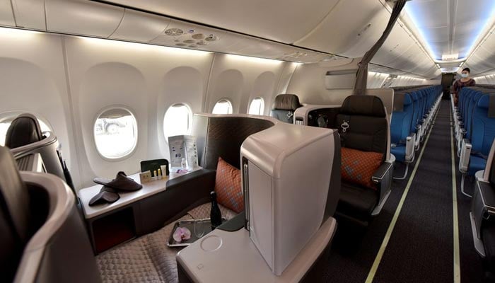 A view of the business cabin, with the economy cabin seen in the background, during Singapore Airlines media preview of their new Boeing 737-8 cabin products, at Changi Airport in Singapore on November 16, 2021. — Reuters/File