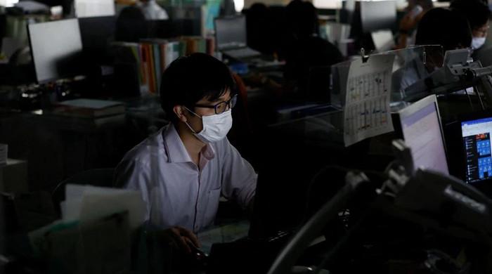 Japanese asked to save power as country's east sizzles