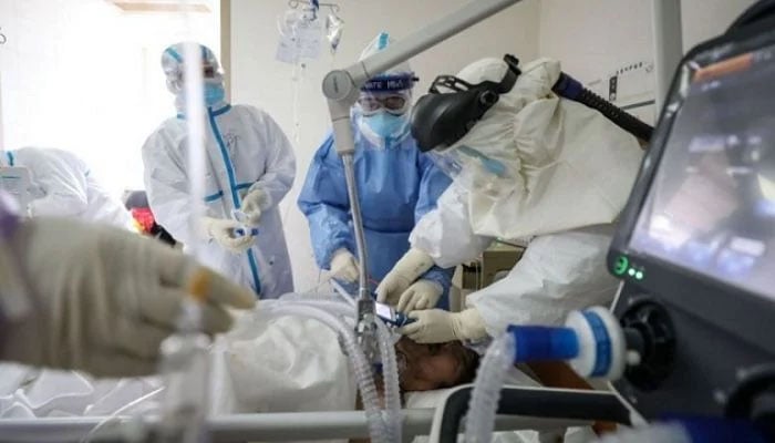 COVID-19 patient being treated in a hospital in Punjab. — AFP