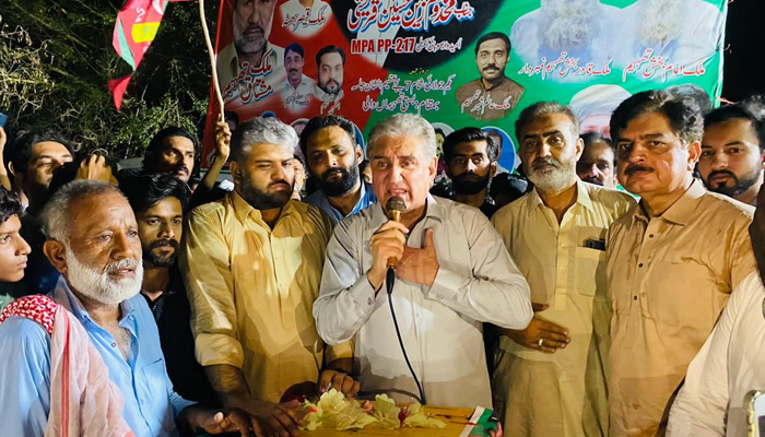 Shah Mehmood Qureshi addresses a rally in Multan ahead of by-poll on PP-217 on Friday. -PTI Multan