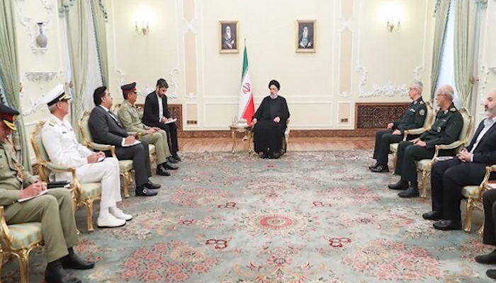 Chairman Joint Chiefs of Staff Committee General Nadeem Raza meeting Iran President Sayyid Ebrahim Raisol-Sadati in this photo released by the Inter-Services Public Relations (ISPR) on July 2, 2022.