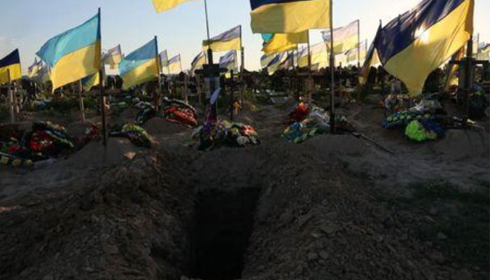 A fresh hole is seen ahead of a funeral, among dozens of recent graves of people who have died since the beginning of Russias invasion, in the Walk of Heroes section of the cemetery, where people who served as military members, fire fighters and police officers are buried, as Russias attack continues, in Kharkiv, Ukraine, July 2, 2022. — Reuters