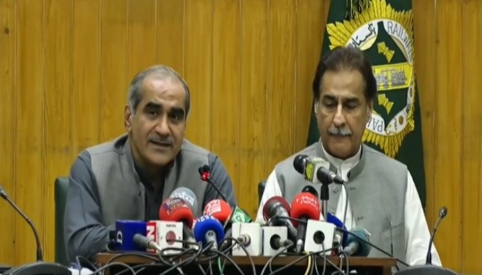 Minister for Railways Khawaja Saad Rafique (L) holding a press conference in Lahore on Sunday, July 3, 2022, alongside Federal Minister for Economic Affairs Sardar Ayaz Sadiq. — Screengrab via Twitter/@pmln_org