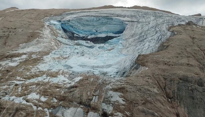 A handout photo from Alpine rescue services shows where an ice glacier collapsed on Marmolada mountain, Italy, July 3, 2022. — Reuters/ Corpo Nazionale Soccorso Alpino e Speleologico