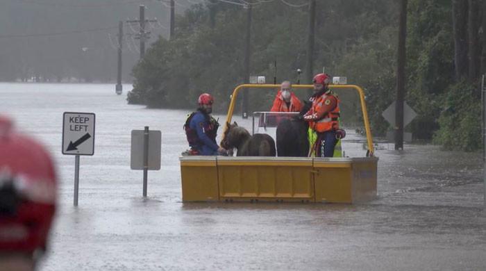 Floods hit southeast Australia, forcing evacuations