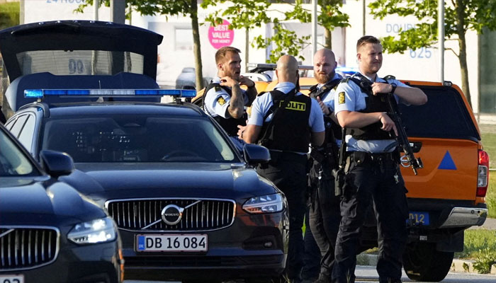 Police officers gather outside Fields shopping center, after Danish police said they received reports of a shooting at the site, in Copenhagen, Denmark, July 3, 2022. Photo— Ritzau Scanpix/Claus Bech via REUTERS