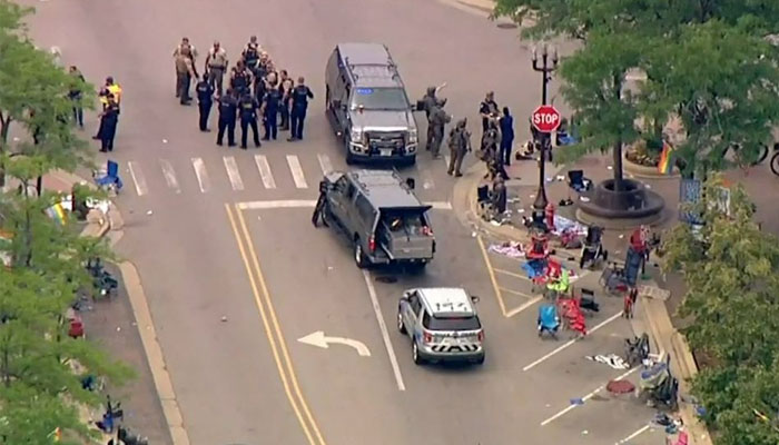 Police deploy after gunfire erupted at a Fourth of July parade route in the wealthy Chicago suburb of Highland Park, Illinois, US July 4, 2022 in a still image from video. Photo— ABC affiliate WLS/ABC7 via REUTERS