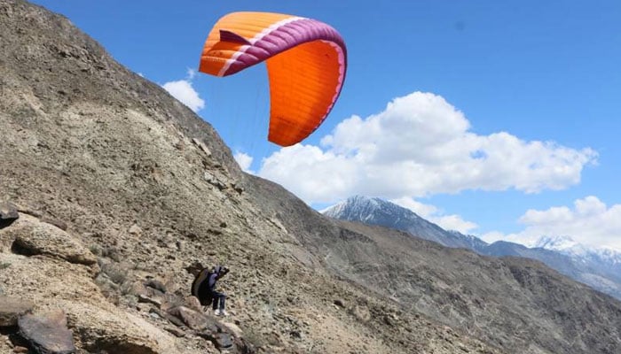 A representational image of a paraglider amid flight. — Facebook