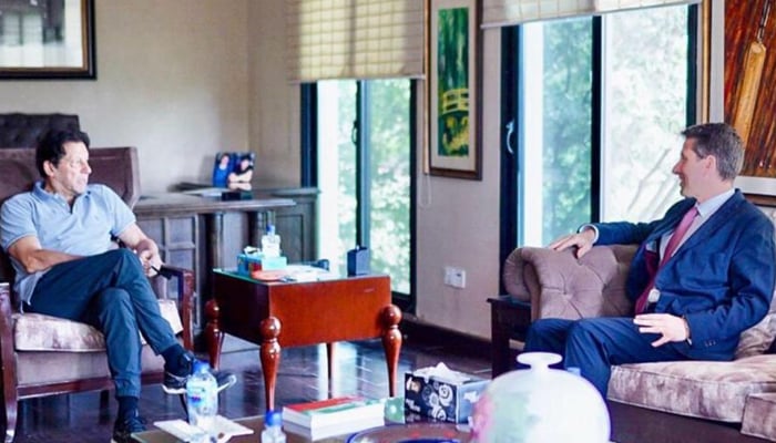 PTI Chairman Imran Khan (left) meets British High Commissioner to Pakistan Christian Turner at Bani Gala in Islamabad, on July 5, 2022. — PTI