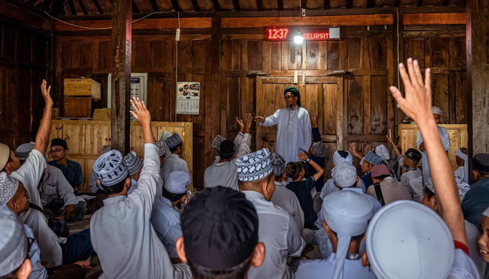 Inside Indonesia's Islamic boarding school for deaf children 17 Donors provide funding for children who cant afford the $68 enrollment fee that covers books, uniforms and toiletries.—AFP