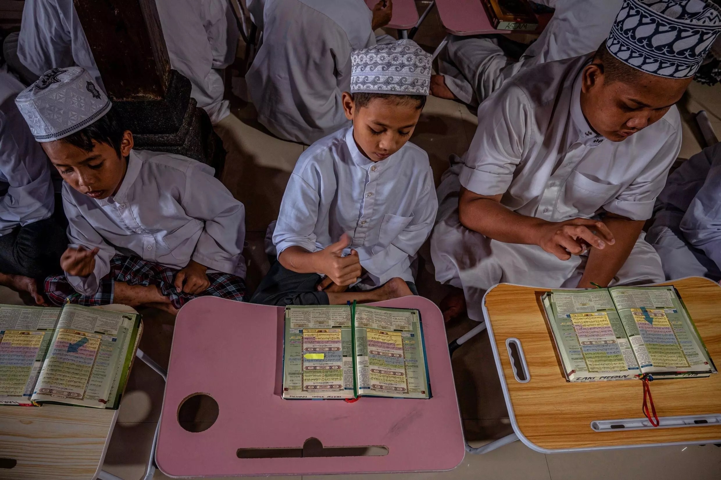 Inside Indonesia's Islamic boarding school for deaf children 16 Students at the school also study mathematics, science and Islamic law in preparation for higher education elsewhere.—AFP