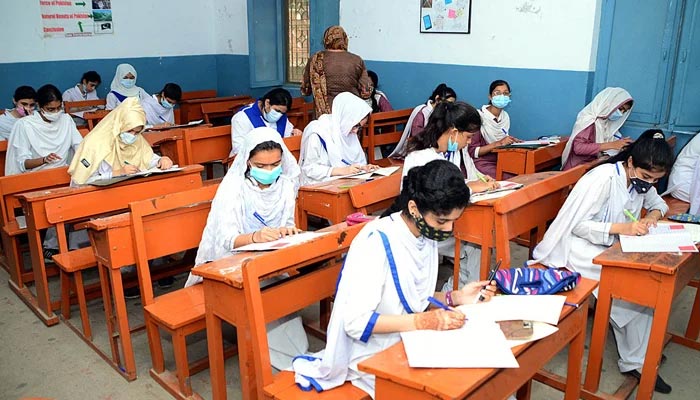 Students solving question papers during their annual examination in Hyderabad, on July 27, 2021. — APP/File