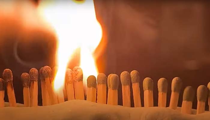 David Rush takes on the record for the most matches snapped in 30 seconds for a Guinness World Records title attempt.—Screengrab via YouTube/David Rush