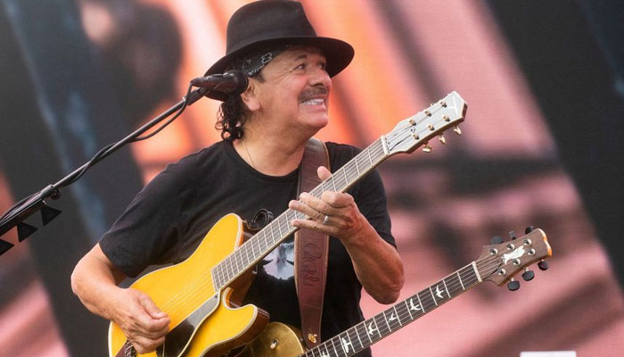 Guitarist Carlos Santana passes out on stage during US concert