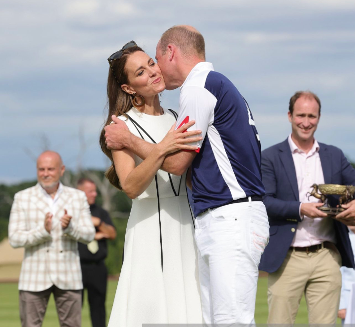 Kate Middleton and Prince William share rare PDA moment