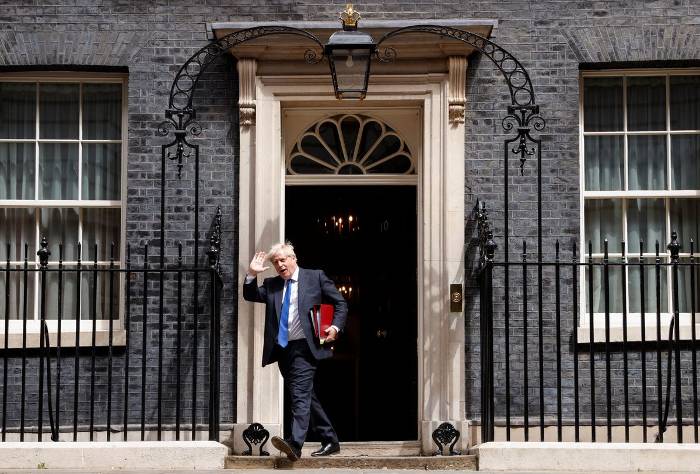 British Prime Minister Boris Johnson walks at Downing Street, in London, Britain, July 6, 2022. Photo— REUTERS/John Sibley