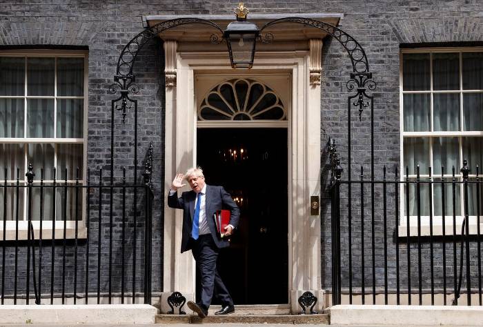 British Prime Minister Boris Johnson walks at Downing Street, in London, Britain, July 6, 2022. Photo— REUTERS/John Sibley