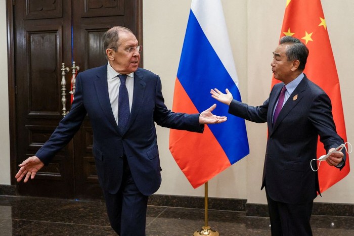 Russian Foreign Minister Sergei Lavrov and Chinese Foreign Minister Wang Yi meet in Denpasar, Indonesia July 7, 2022. Photo— Russian Foreign Ministry/Handout via REUTERS