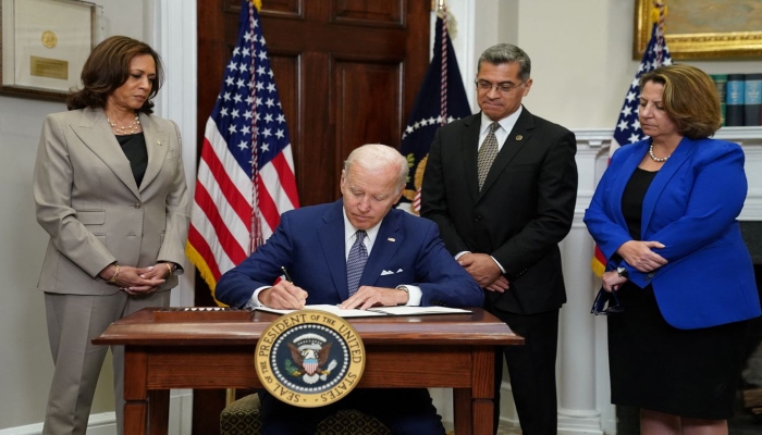 US President Joe Biden signs an executive order to help safeguard womens access to abortion and contraception after the Supreme Court last month overturned Roe v Wade decision that legalized abortion, as Vice President Kamala Harris, Health and Human Services Secretary Xavier Becerra and Deputy Attorney General Lisa Monaco stand at his side at the White House in Washington, US, July 8, 2022. Photo—REUTERS/Kevin Lamarque