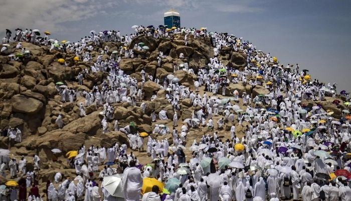 Muslim pilgrims gather atop Mount Arafat, southeast of the holy city of Mecca. This year, participation was capped at almost one million fully vaccinated worshippers.— AFP