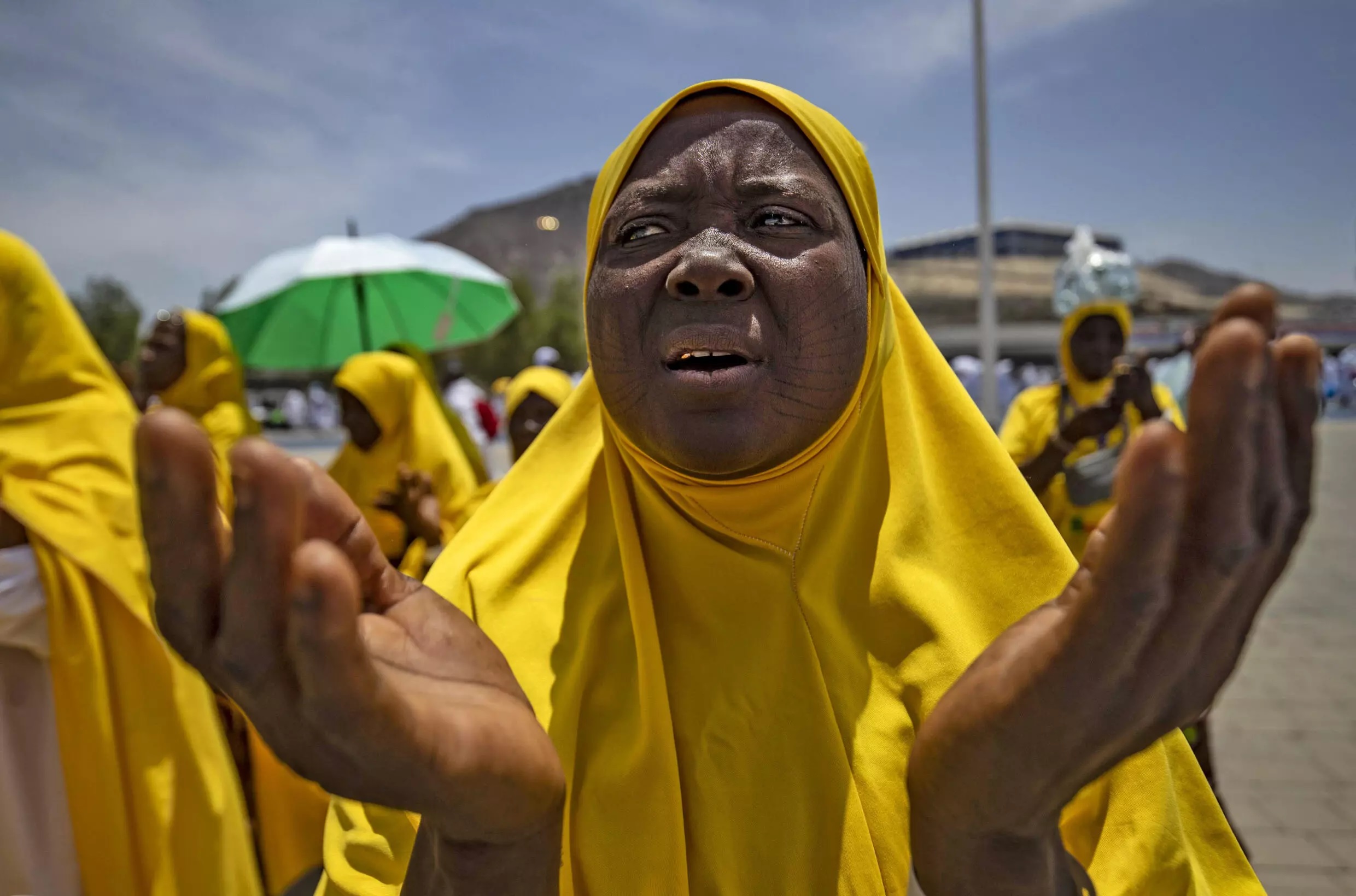 A Muslim woman prays around Mount Arafat.— AFP