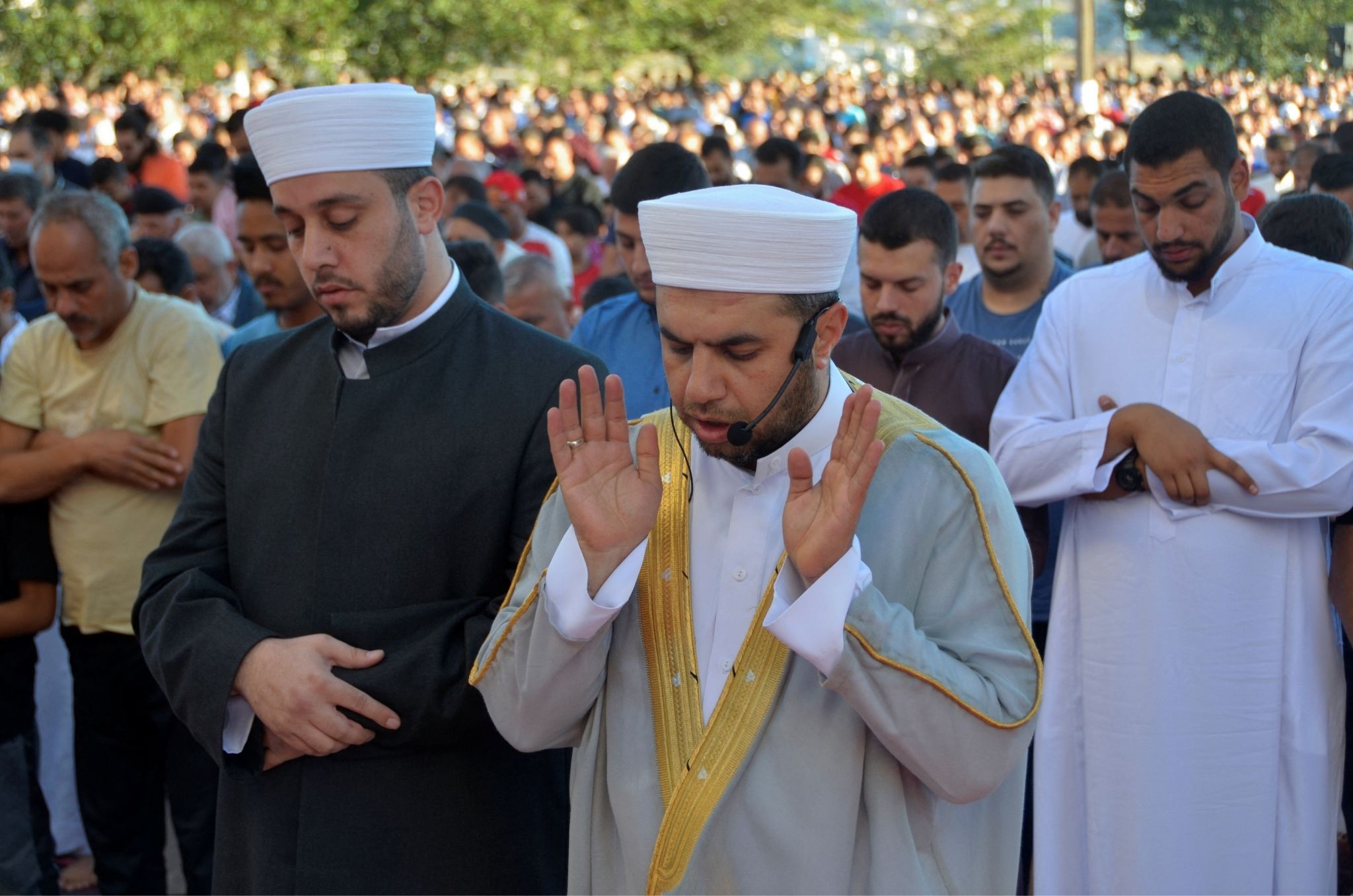 Muslims pray on the first day of Eid al-Adha in Amman, Jordan, July 9, 2022.