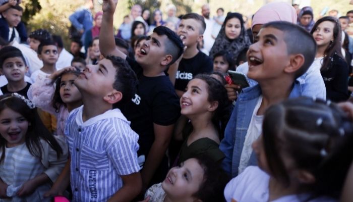 Palestinians celebrate on the first day of Muslim holiday of Eid al-Adha on the compound known to Muslims as Noble Sanctuary and Jews as Temple Mount, in Jerusalems Old City, July 9, 2022. — Reuters