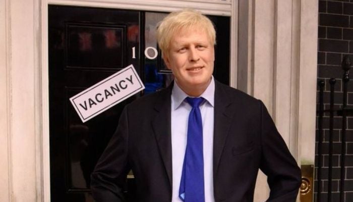 Boris Johnsons wax statue outside a job centre.— Twitter/Spriteer