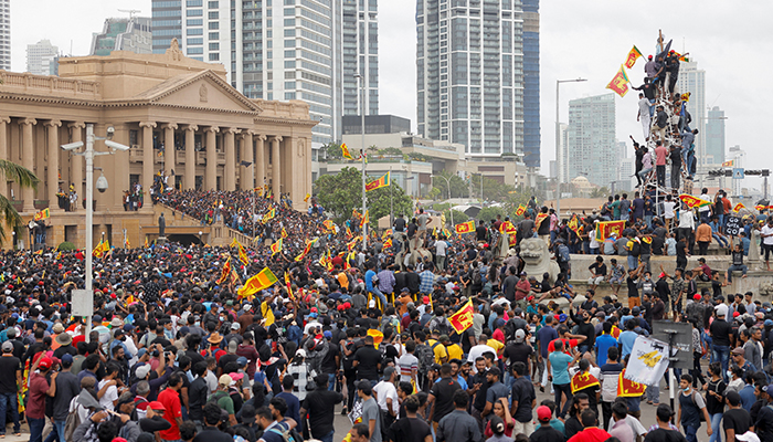 Demonstrators celebrate after entering the Presidential Secretariat during a protest, after President Gotabaya Rajapaksa fled, amid the countrys economic crisis, in Colombo, Sri Lanka July 9, 2022. — Reuters