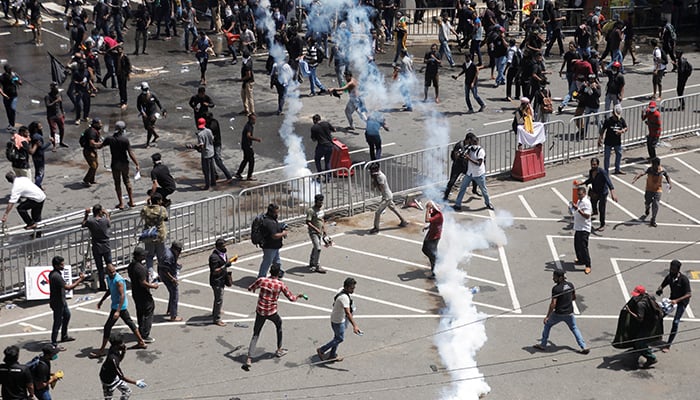 Police use tear gas to disperse demonstrators near Presidents residence during a protest demanding the resignation of President Gotabaya Rajapaksa , amid the countrys economic crisis, in Colombo, Sri Lanka, July 9, 2022. — Reuters