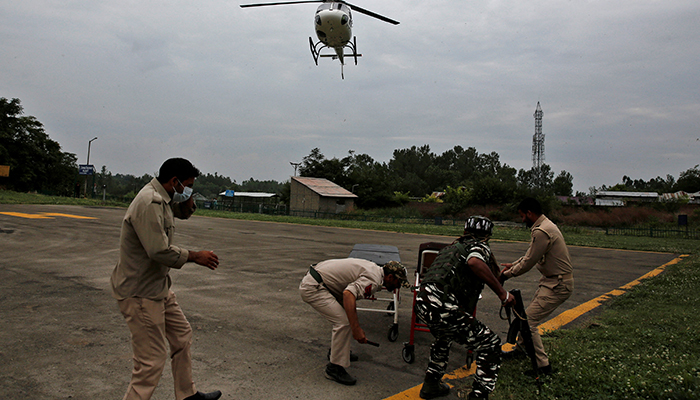 A helicopter arrives carrying injured people for treatment following a cloudburst near the holy Amarnath cave shrine, at Sher-i-Kashmir Institute of Medical Sciences hospital in Srinagar, on July 9, 2022. — Reuters