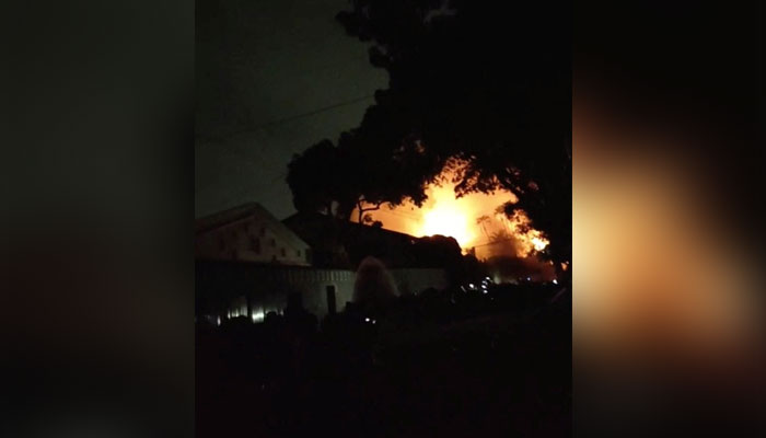 A fire burns at Prime Minister Ranil Wickremesinghes house, after it was set on fire by protestors, amid the countrys economic crisis, in Colombo, Sri Lanka, July 9, 2022 in this screen grab obtained from social media video. — Pradas S Agnya/via Reuters